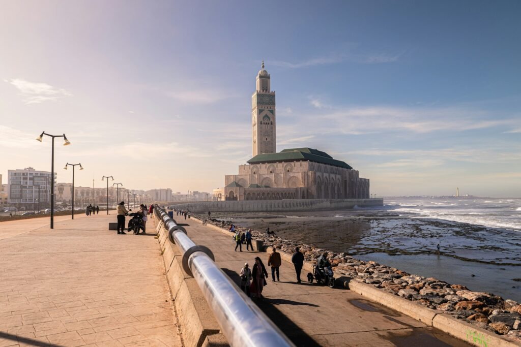 Atlantic corniche of Casablanca, with the Hassan II Mosque in the distance