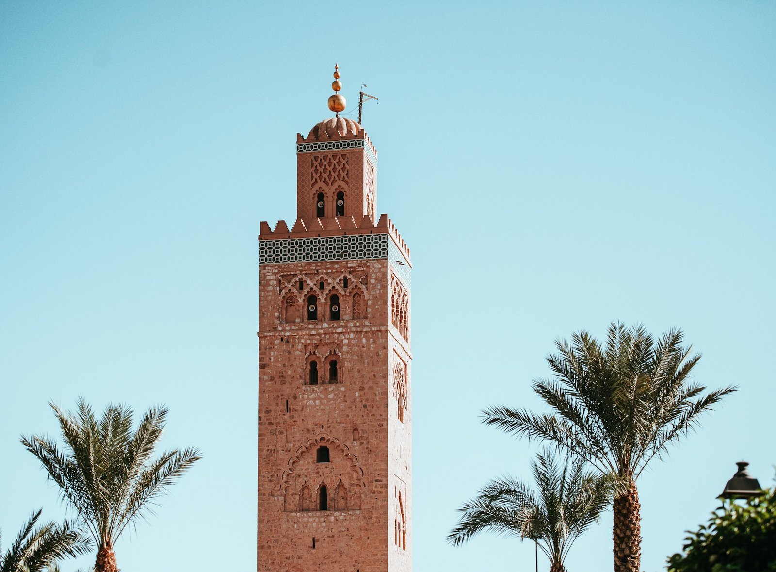 Koutoubia minaret and palm trees in Marrakech
