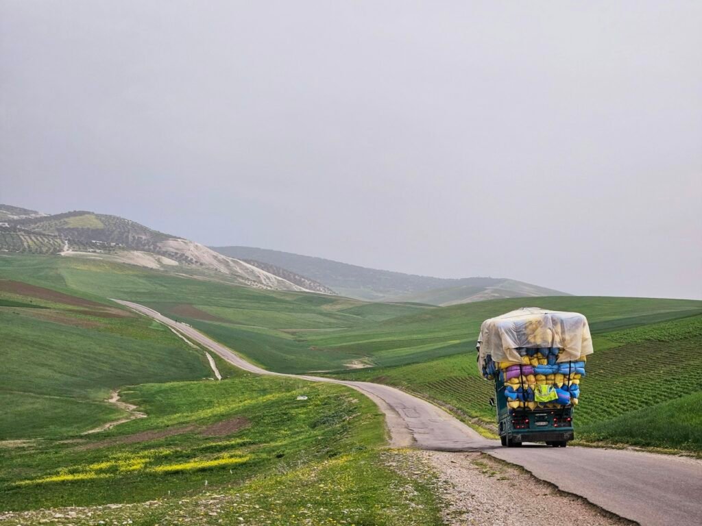 Road through the Moroccan countryside on a two day transfer with an overnight