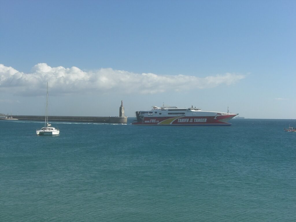 A fast catamaran ferry leaving the port of Tarifa for Tangier